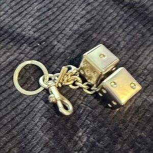 Coach Metallic silver dice keychain